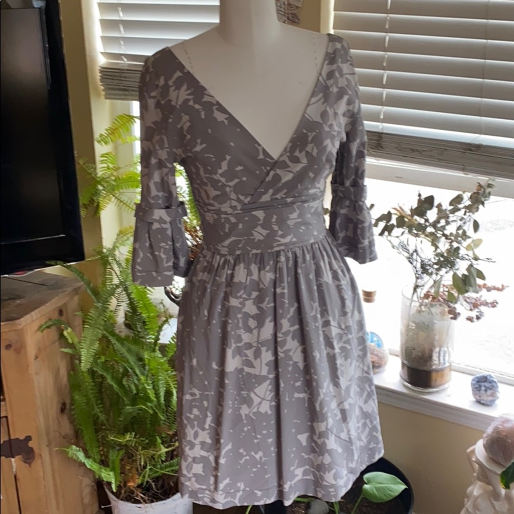 V neck grey floral dress, band waist with pleats